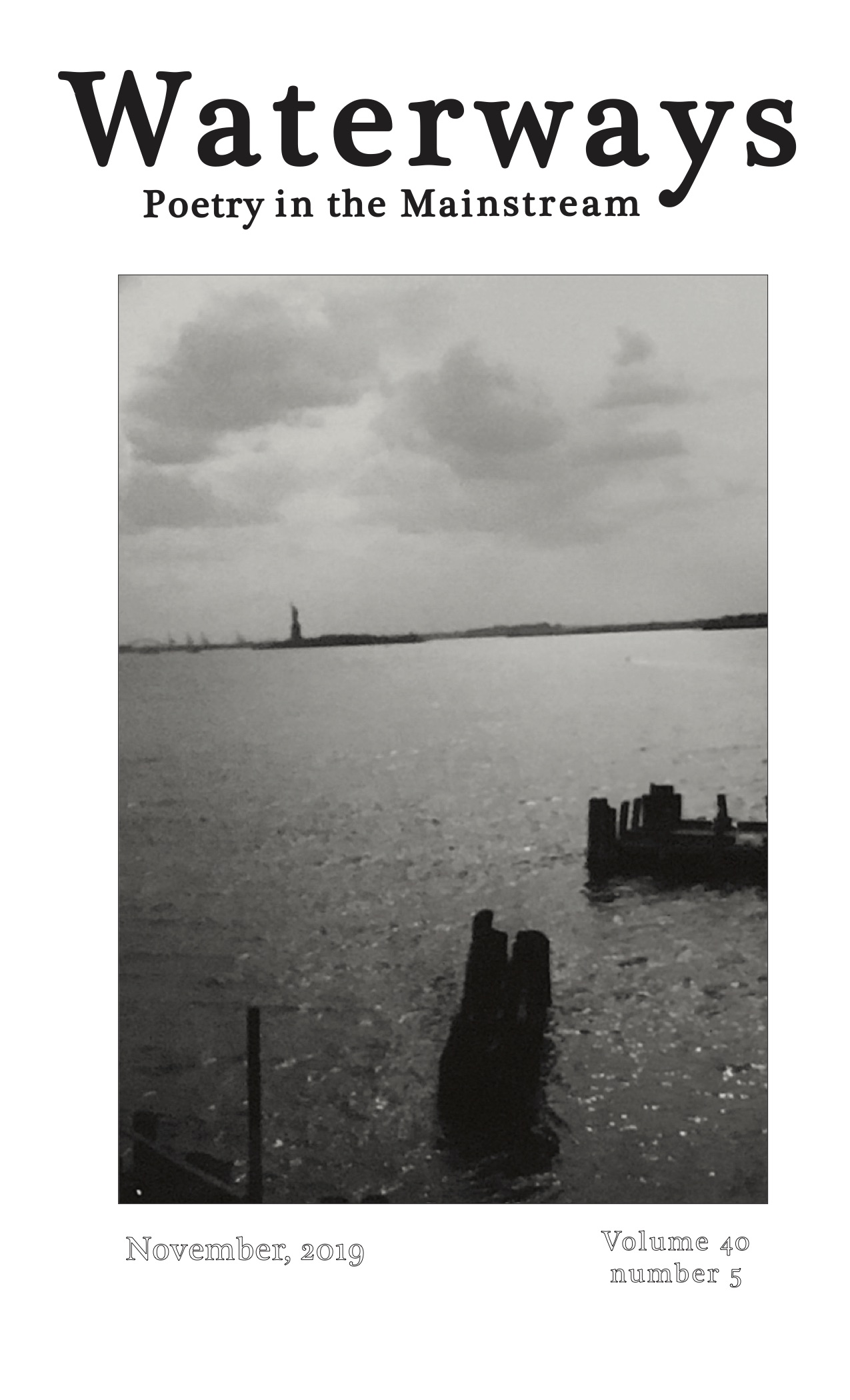 Statue of Liberty seen from a far shore on the bay
