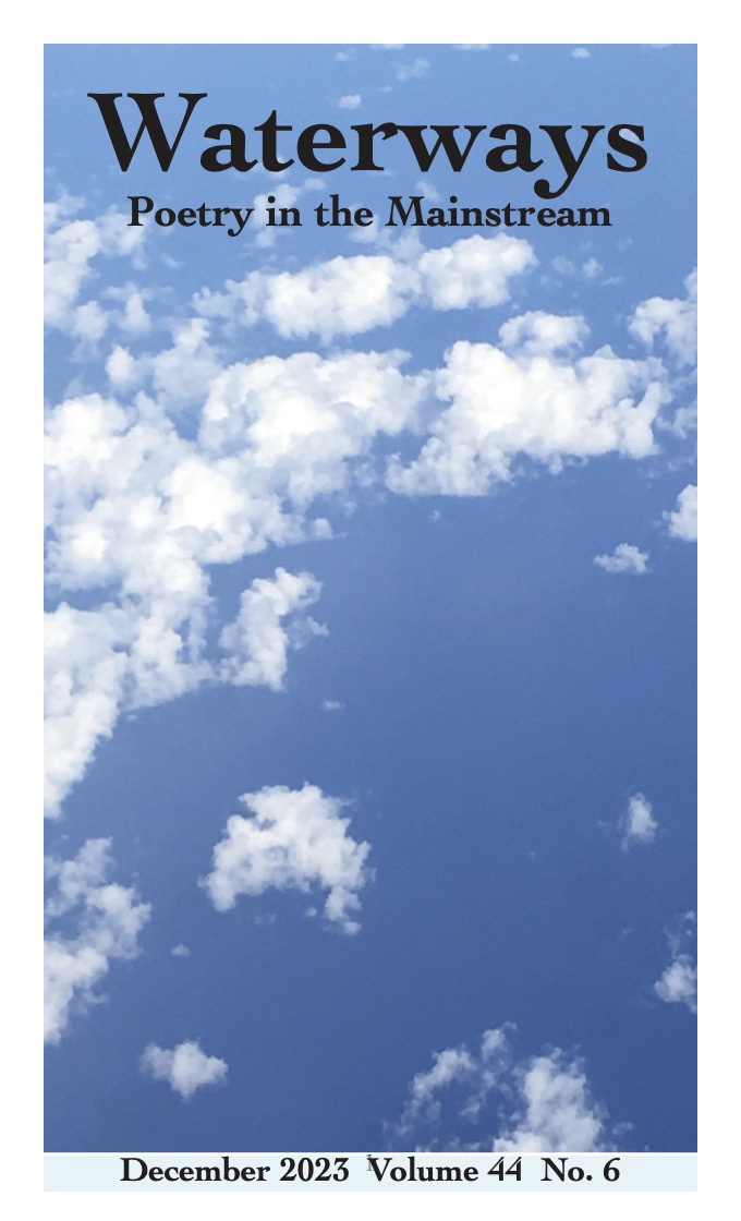 Cover for December is a photograph of a blue sky with a few puffy white clouds